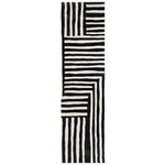 Top view of the Sentinel Pathway Hand Tufted Wool Rug featuring a striking black and white geometric pattern. This runner rug is perfect for adding a contemporary touch to your hallway or kitchen. Its durable wool construction makes it a stylish and practical choice for high-traffic areas like the kitchen, bathroom, or any hallway needing a modern upgrade.