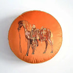 Round decorative throw pillow featuring a beautifully illustrated horse on an orange background, perfect for home decor.