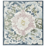 Top view of the Soft Bloom Rhapsody Hand Tufted Area Rug, showcasing an elegant floral design. This wool rug features soft pastel hues with intricate floral patterns, making it a perfect centerpiece for living room rugs 8x10.