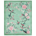 Beautiful Springtime Tale Hand Tufted Area Rug showcasing an elegant design of birds and flowers on a soft green background, perfect as a wool rug for living rooms.