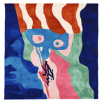 Vibrant and contemporary Staring Void Tapestry Hand Tufted Area Rug featuring abstract patterns in bold colors like blue, red, and green. Ideal for large living rooms, this wool square area rug adds a modern touch to any space.