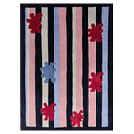 Top view of a Stripe Splat Pop Hand Tufted Area Rug featuring bold vertical stripes in pink, blue, and cream, accented with red and blue abstract splat designs. Ideal for adding a contemporary touch to living room area rugs, this wool rug is perfect for those seeking stylish rugs for living room spaces.