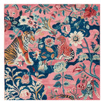 Decorative rug with tigers and floral patterns on a pink and blue background