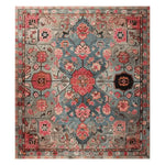 This stunning area rug showcases an intricate floral mosaic design in vibrant shades of red, blue, and pink. Perfect for large living rooms, this hand-tufted wool rug adds a touch of elegance and warmth, making it an ideal choice for area rugs in living rooms.