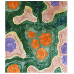 The Verdant Kaleidoscope Hand Tufted Wool Rug showcases a vibrant abstract design with green, orange, and purple floral patterns, perfect for adding a splash of color to any living room. This area rug, crafted from high-quality wool, is ideal for those seeking unique living room area rugs or area rugs for living room spaces.