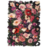 Vibrant floral area rug perfect for living rooms, featuring an array of colorful flowers in rich hues, hand-tufted from wool for a luxurious feel.