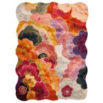 The Wildflower Waterfall Hand Tufted Wool Rug features a vibrant, floral design in rich shades of orange, pink, and purple. This large area rug is perfect for adding a touch of nature-inspired elegance to any living room space.