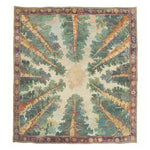 The Woodland Charm Hand Tufted Rug is a stunning area rug perfect for any living room. This wool rug features a unique forest-inspired design, with tree patterns radiating from the center, encompassed by a decorative border. Ideal for those seeking large living room rugs that are both stylish and functional.