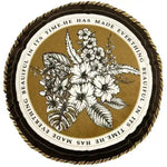 Vintage velvet throw pillow featuring floral design and decorative tassels.