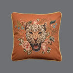 Roaring leopard floral velvet throw pillow cover with fringe, featuring intricate embroidery and vibrant floral designs.