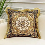 Royal fringed jacquard throw pillow featuring intricate circular designs in gold and navy, perfect for adding elegance to any decor.
