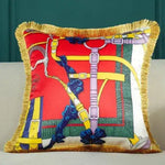 Vibrant throw pillow featuring a royal animal collection print with colorful straps and fringed edges, perfect for home decor.