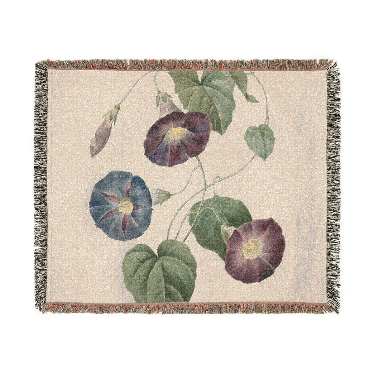 A woven throw blanket featuring a botanical pattern of purple and blue morning glories with green leaves on a beige background, finished with a fringed border.