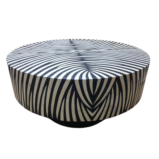 Experience harmony with the Zebra Harmony Bone Inlay Round Coffee Table. Its mesmerizing zebra pattern, intricately crafted with bone inlay, brings a touch of the wild to your living space. With its unique design and sturdy construction, it's both a statement piece and a functional addition.