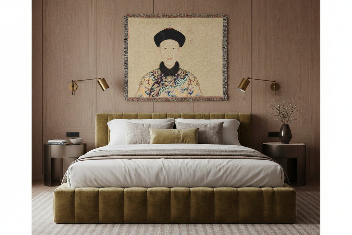 A rectangular woven tapestry featuring a portrait of an emperor in traditional Chinese attire, with multicolor fringe on all sides, shown against a plain white background.