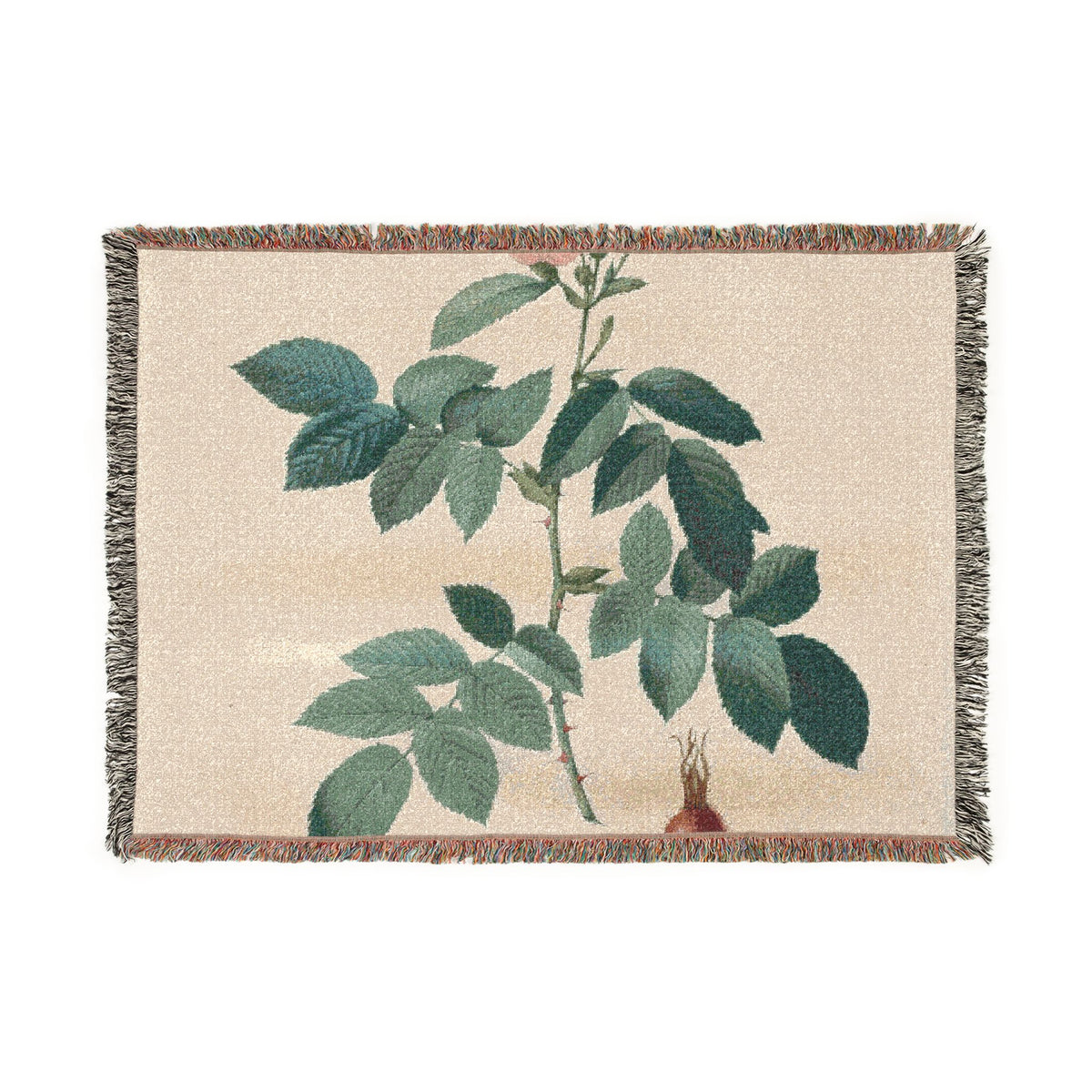A rectangular woven throw blanket with fringed edges, featuring a botanical design of green rose leaves and buds on a warm beige background.