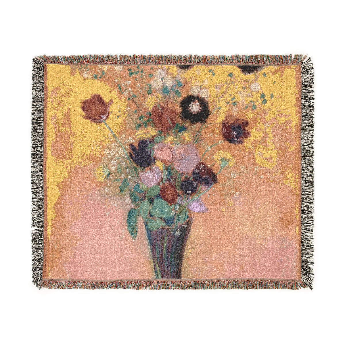 A square woven throw blanket featuring a floral bouquet in a vase against a warm yellow and peach background, finished with fringed edges.