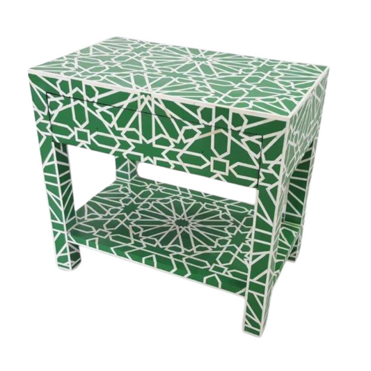 Enrich your space with the Emerald Elegance Bone Inlay 1 Drawer Side Table. Crafted with meticulous detail and featuring a stunning emerald hue, this piece exudes sophistication. Its intricate bone inlay design adds a touch of luxury to any room.