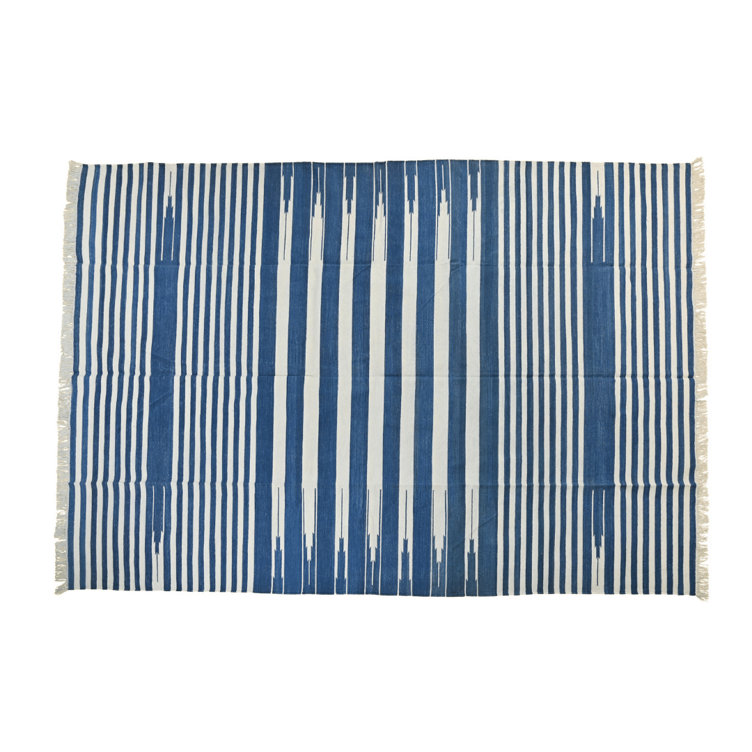 Indulge in tranquil luxury with the "Handwoven Azure Serenity Fringe Haven" cotton rug. Its azure hues evoke calmness and serenity, while the handwoven cotton offers a soft and inviting texture. Finished with delicate fringes, this rug creates a haven of comfort and style in any space.
