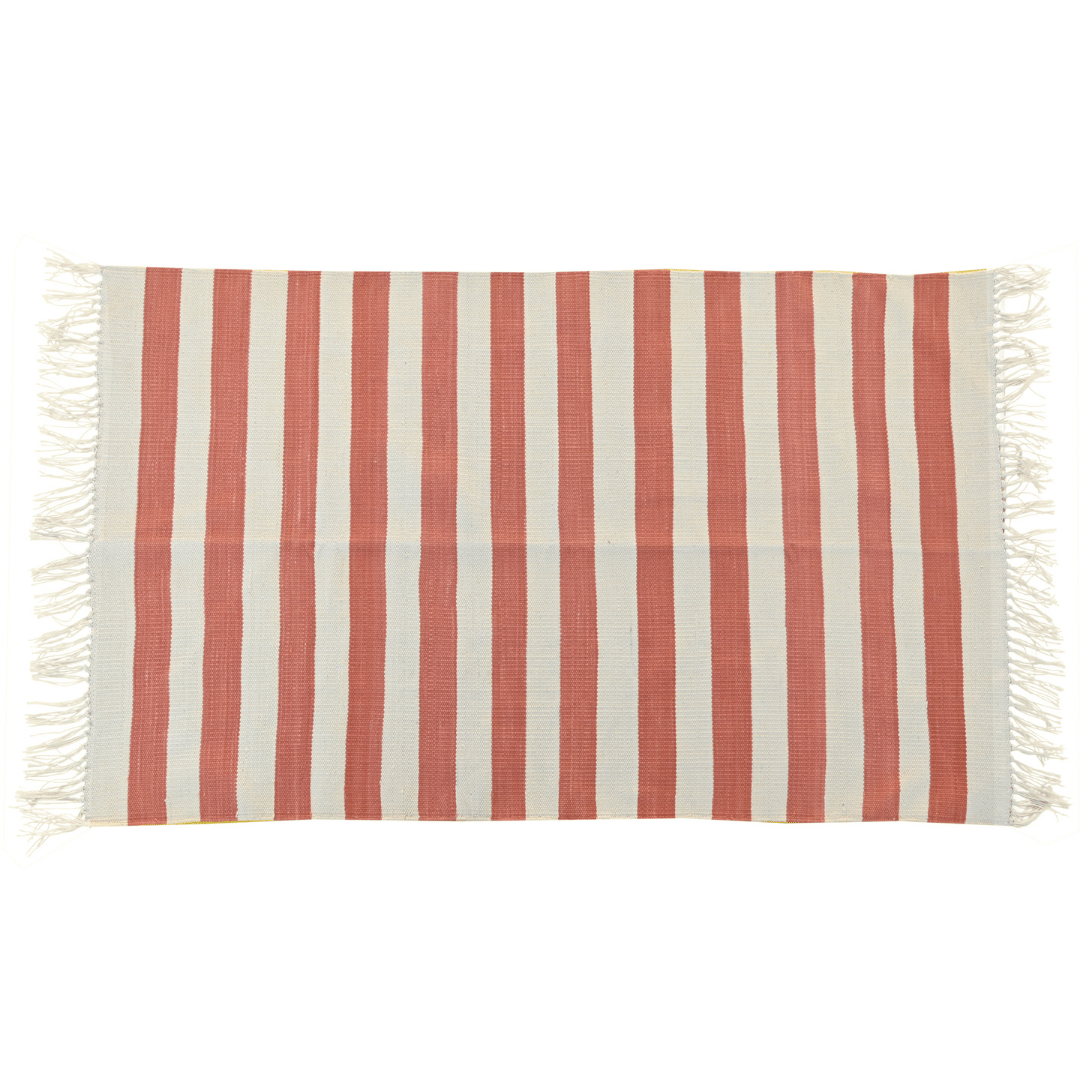 Brighten up your space with this handwoven orange and white stripe cotton rug. Its vibrant colors and classic pattern add a cheerful touch to any room. Finished with fringes for added flair, this rug brings both style and comfort to your home decor.