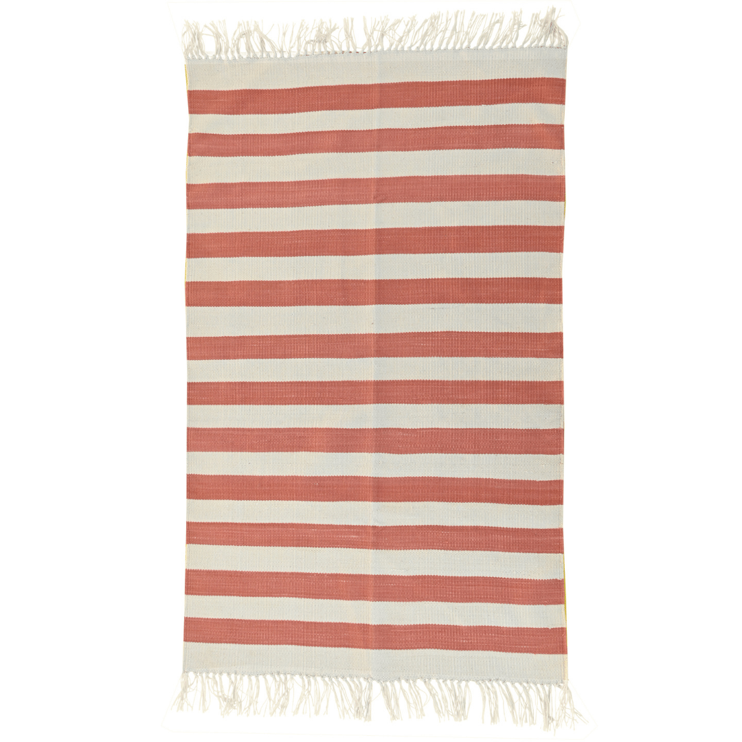  Brighten up your space with this handwoven orange and white stripe cotton rug. Its vibrant colors and classic pattern add a cheerful touch to any room. Finished with fringes for added flair, this rug brings both style and comfort to your home decor.