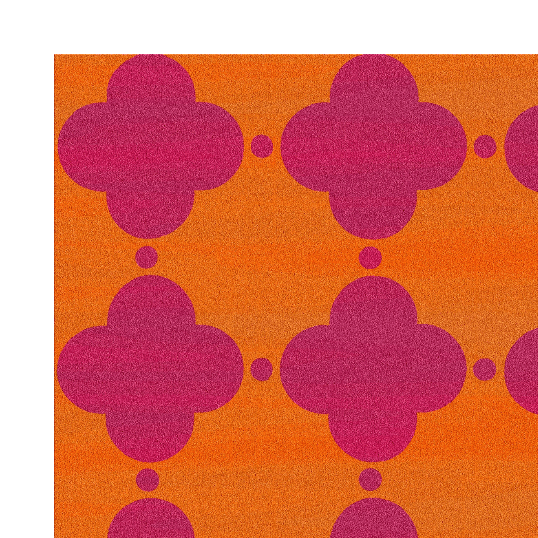 An orange pink clovers hand-tufted rug could add a vibrant and cheerful touch to a room. The combination of orange and pink colors, along with the clover motif, creates a playful and lively design that can brighten up any space. The hand-tufted construction ensures that the rug is soft, durable, and of high quality. This type of rug could work well in a variety of spaces, from a children's room to a living room, adding a pop of color and a sense of fun to the decor.