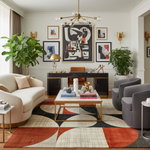 Modern living room with a geometric rug, sofa, coffee table, and decorative wall art.