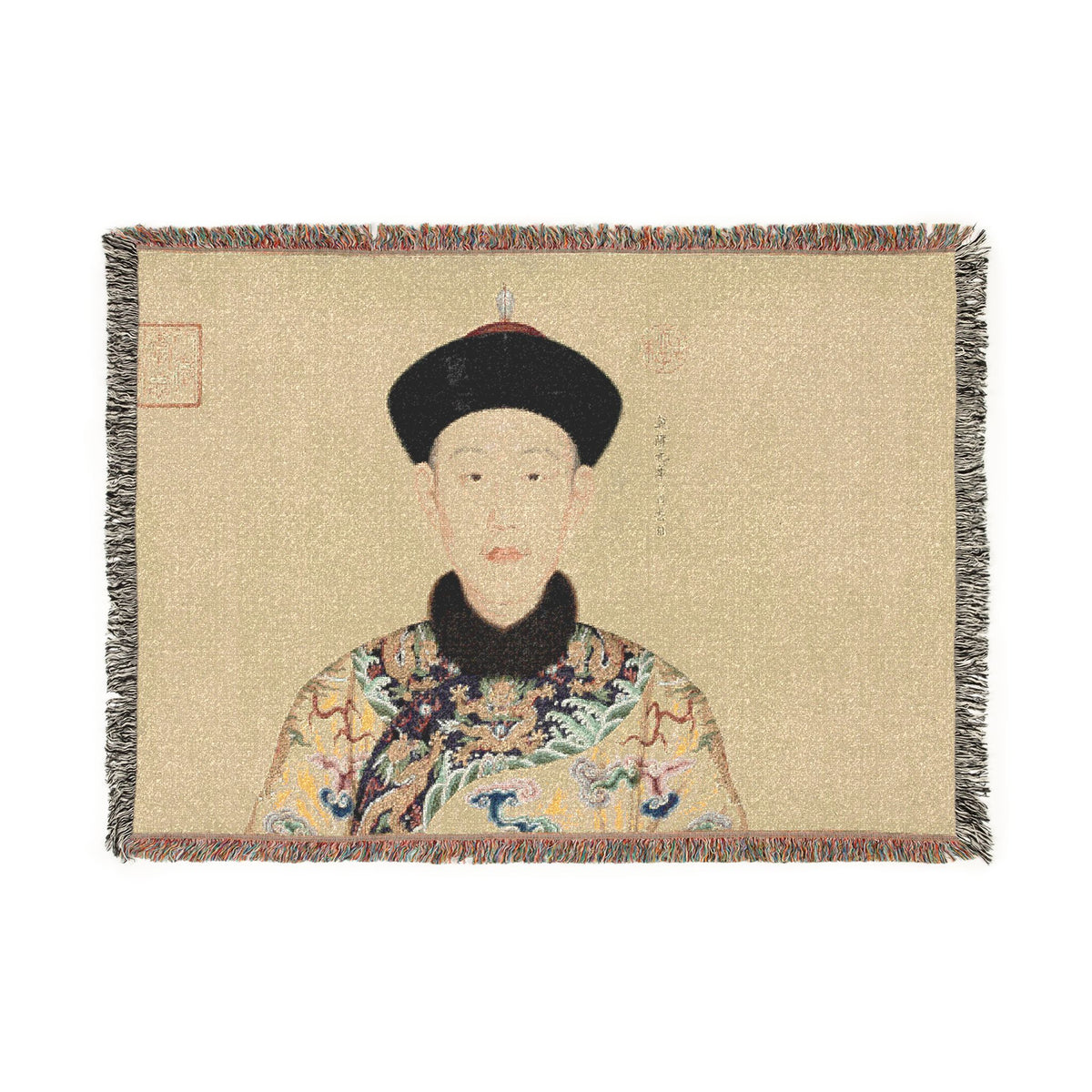 A rectangular woven tapestry featuring a portrait of an emperor in traditional East Asian attire, with fringe along all edges, shown against a plain white background.