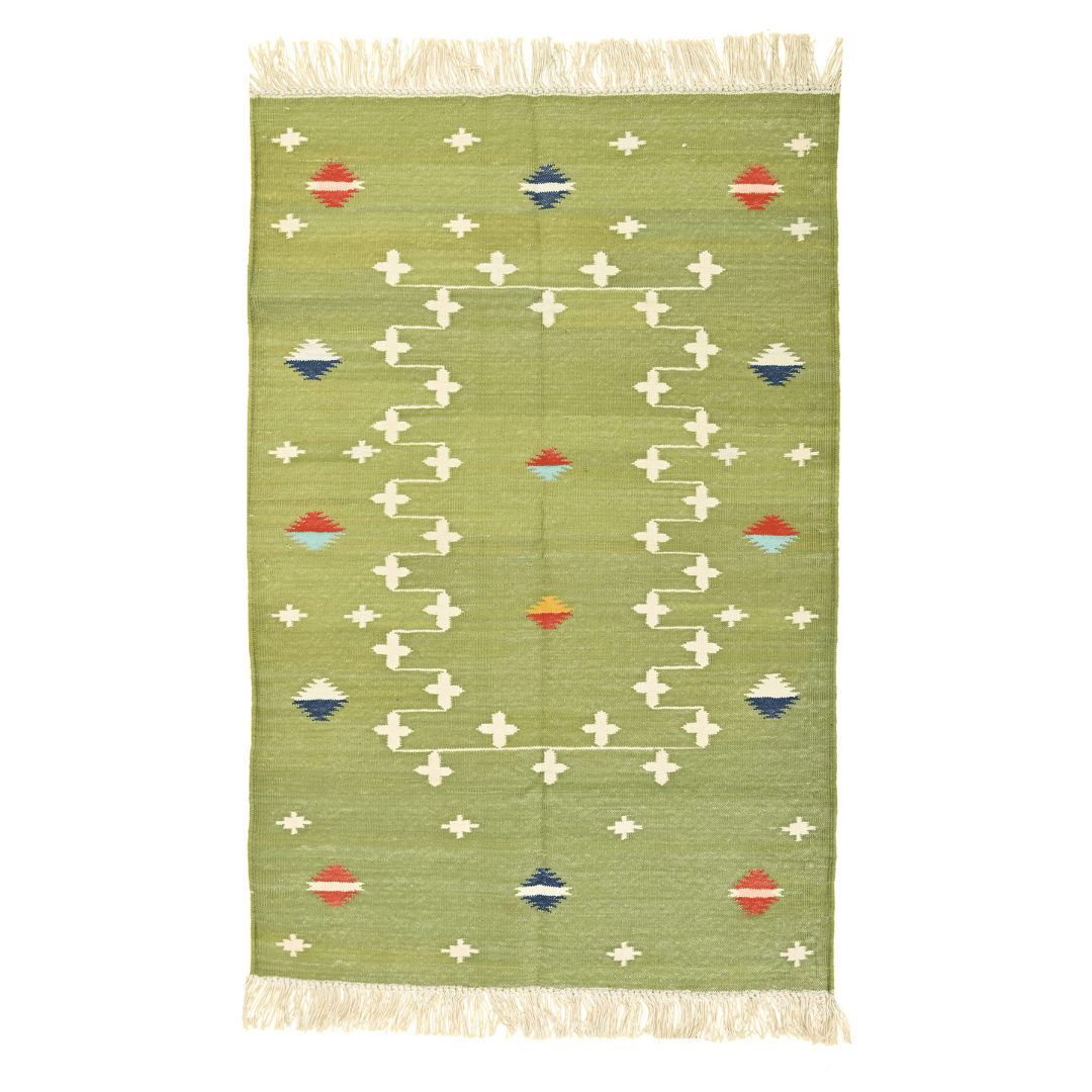 Rug with Fringes." Its intricate pattern and soothing light green hue bring a touch of natural beauty to any room. Finished with delicate fringes, this rug adds both charm and texture to your décor