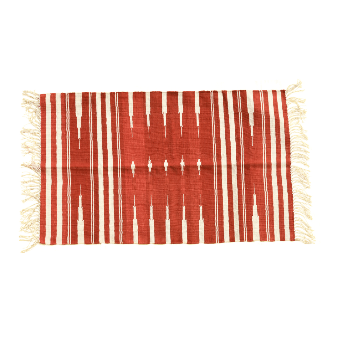 Introduce a timeless touch to your space with the "Handwoven Red and White Stripe Patterned Cotton Rug with Fringes." Its classic stripe pattern in bold red and white hues exudes elegance and sophistication, while the fringes add a charming accent. Handcrafted with care, this rug brings both style and comfort to any room in your home.