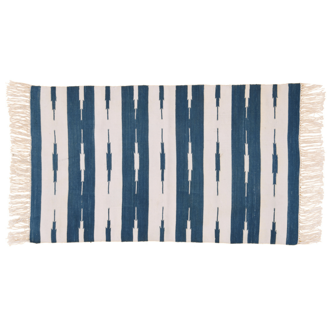 Elevate your space with this handwoven blue and white stripe Ikat cotton rug. Its intricate pattern adds depth and interest, while fringes offer a delightful accent. Durable and soft, it's a stylish addition to any room.