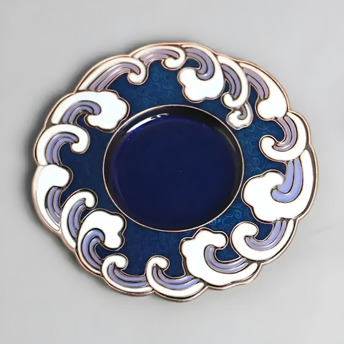 Cobalt blue enamel incense dish with white and lavender wave border, top view
