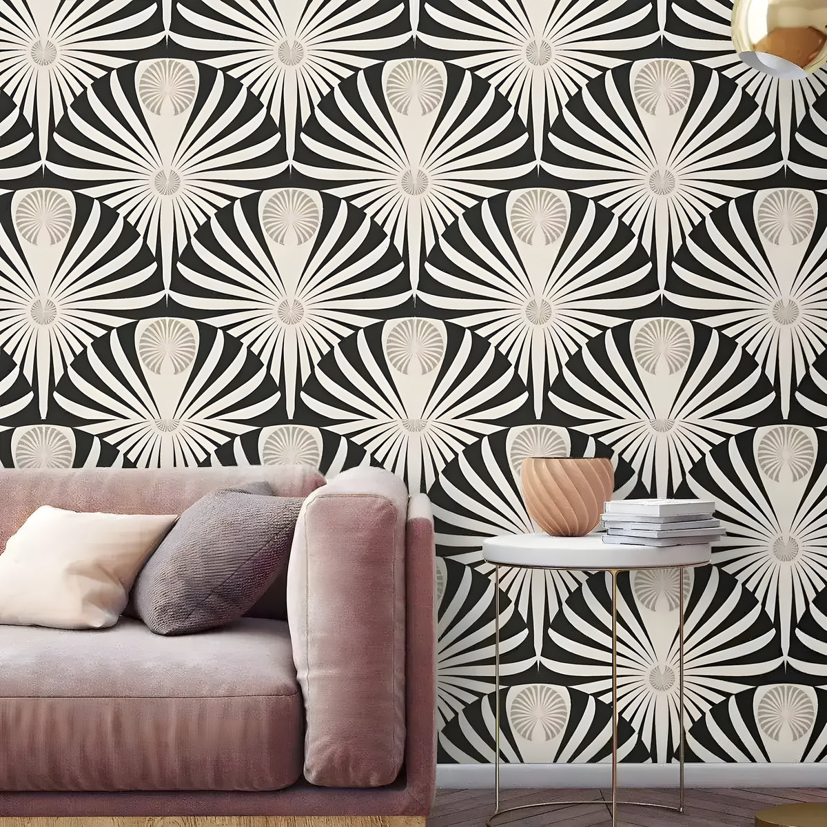 Black and white Art Deco fan wallpaper behind a blush velvet sofa and marble table