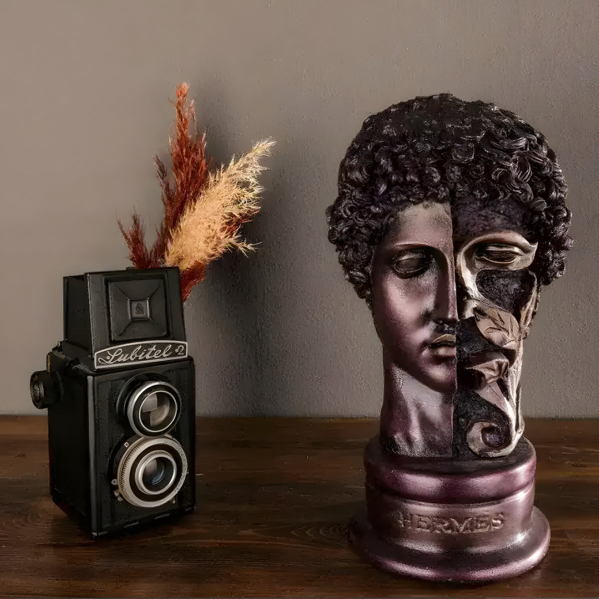 Bronze Hermes bust on round base, curly hair and carved leaf detail on face