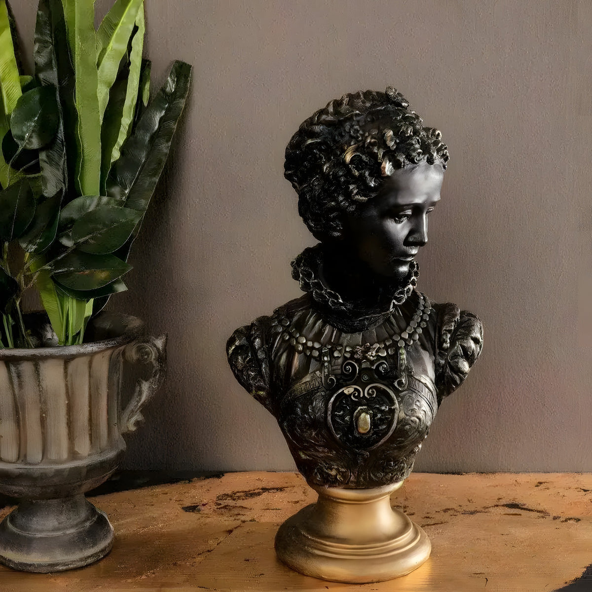 Maria Antoinette bust in dark bronze finish with ornate gown and ruff collar on gold pedestal