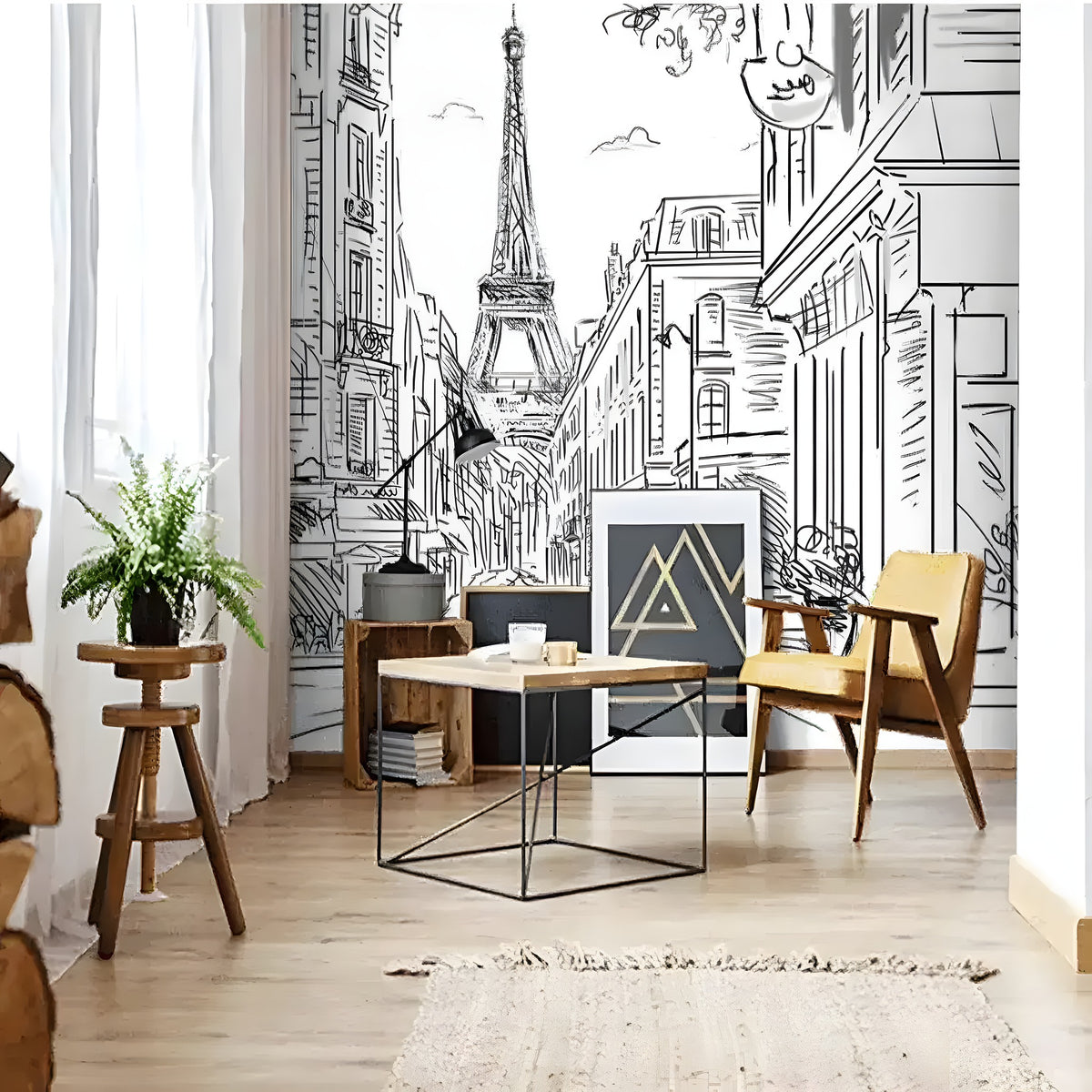 Sketched Paris street mural with Eiffel Tower in black and white, in a nook with yellow chair