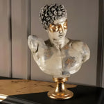 Hermes bust sculpture with distressed cream finish, gold-leaf eyes, on gold pedestal