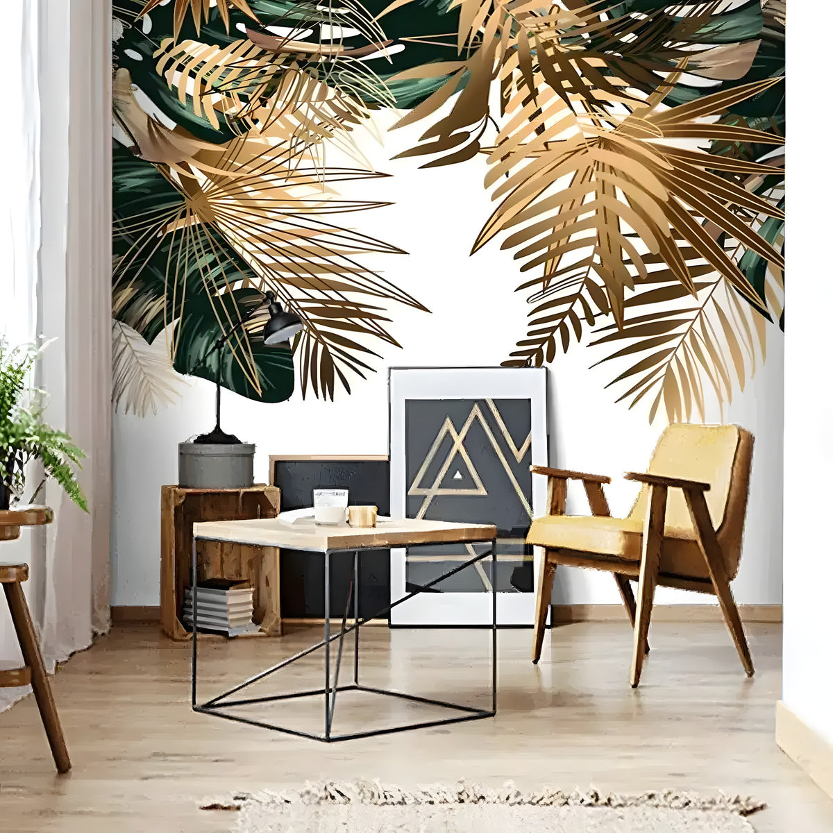 Gold and green palm leaf mural behind yellow armchair and wood coffee table