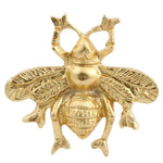 Brass bumble bee cabinet knob with finely textured wings and body on white