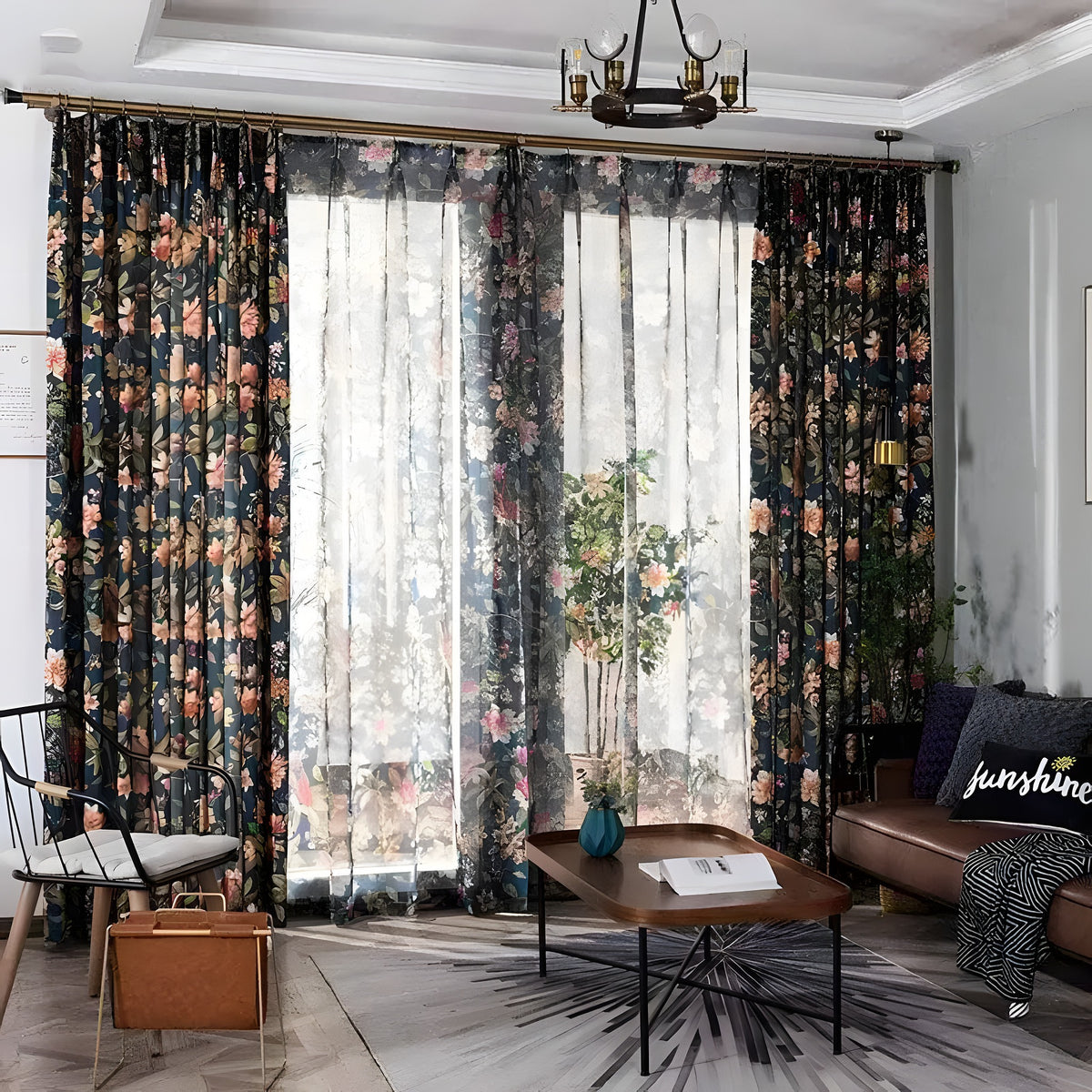 Nina navy floral curtains framing a sheer-paneled window in a living room