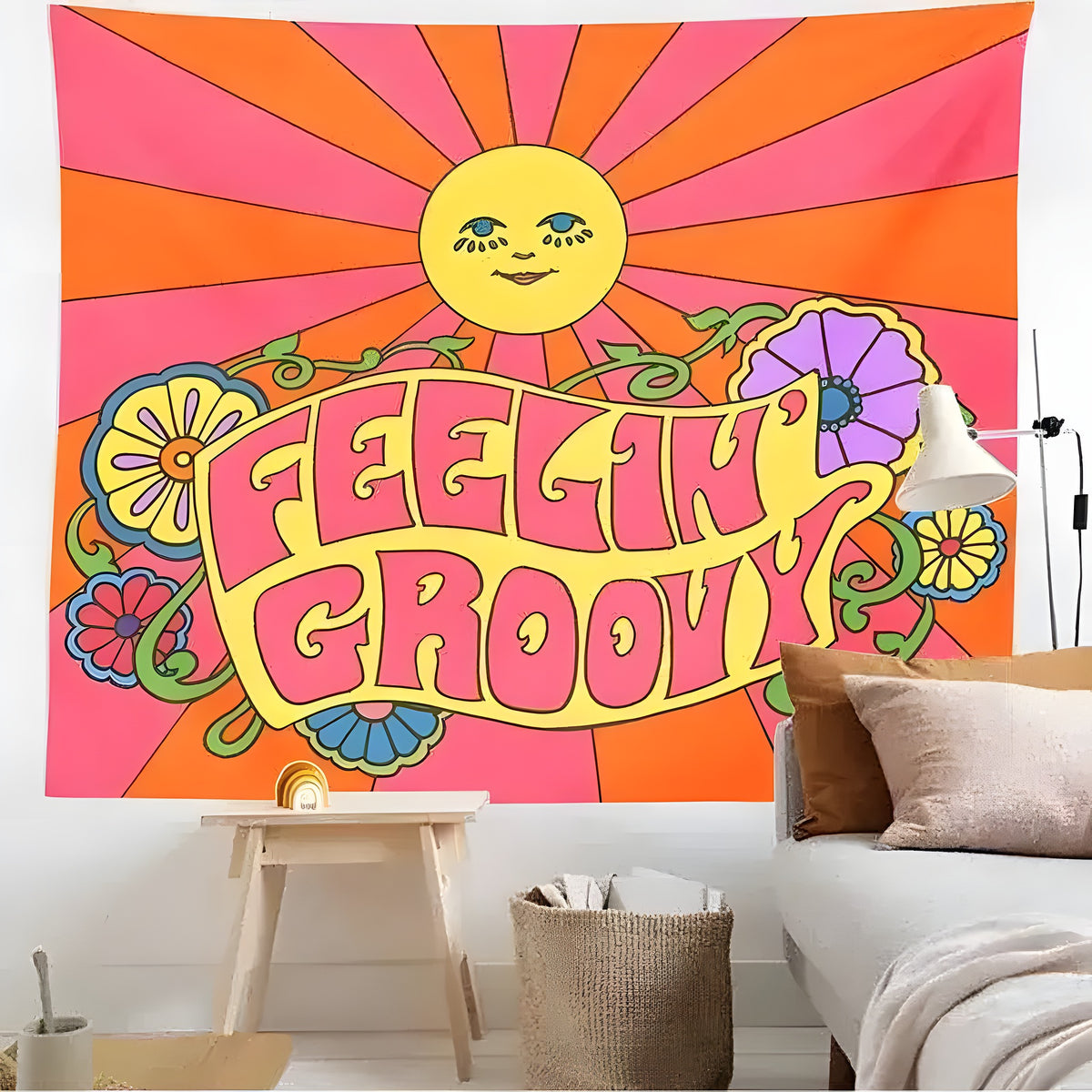 Feelin' Groovy retro tapestry with sun face and flowers hung on wall above a couch and bench