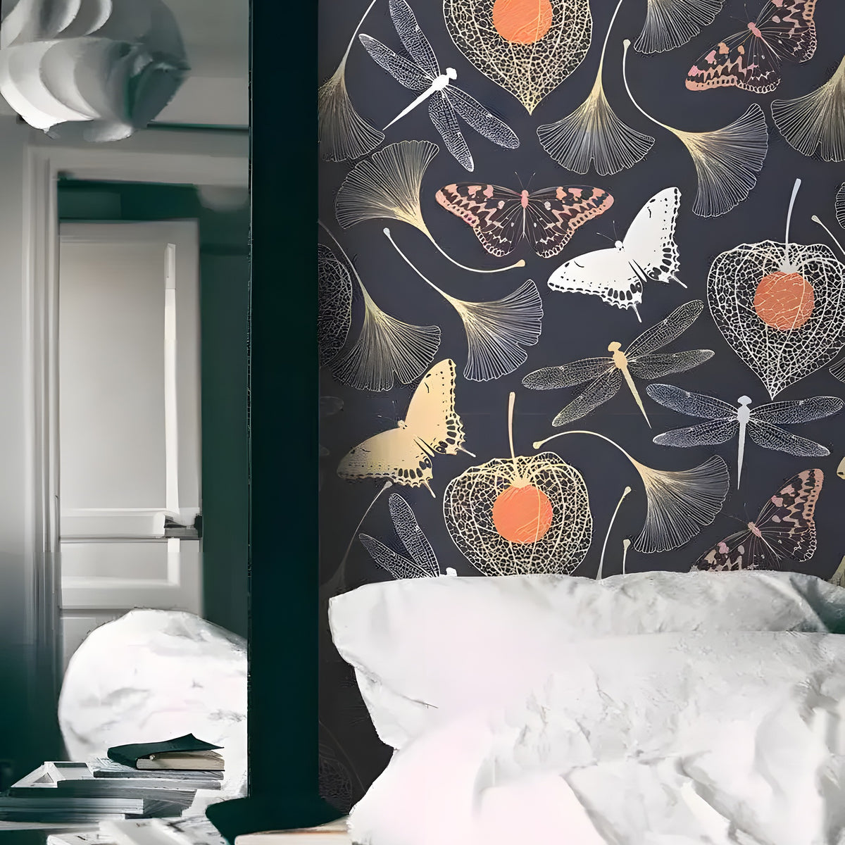 Ginkgo leaves garden wallpaper installed behind a bed — dark navy ground, gold butterflies, dragonflies and orange lantern pods