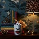 Red Lip Ceramic Candle Jar with Lid styled in a room setting