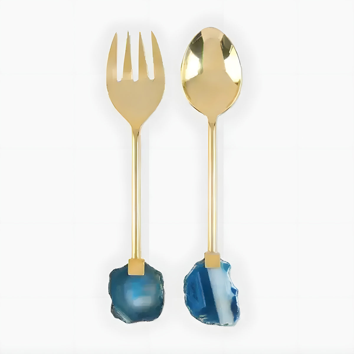 Stainless steel blue agate gold salad serving set, gold-toned fork and spoon with irregular blue agate stone handles, grey background
