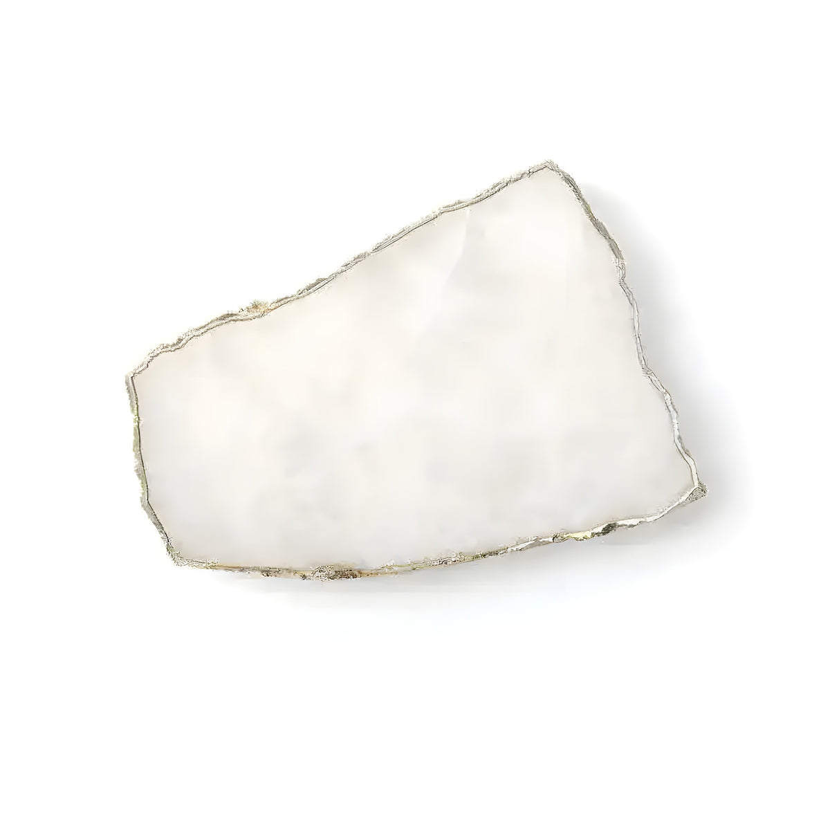 Flat lay of white agate cheese board slice with gold trim edges on white background