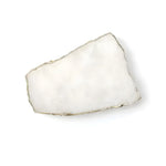 Flat lay of white agate cheese board slice with gold trim edges on white background