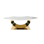 Half moon marble table top on a polished gold curved stainless steel base on white background
