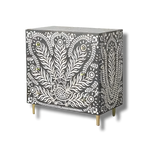 Peacock Design Bone Inlay 3 Drawers Dresser with white feather pattern on charcoal ground, brass legs, angled view