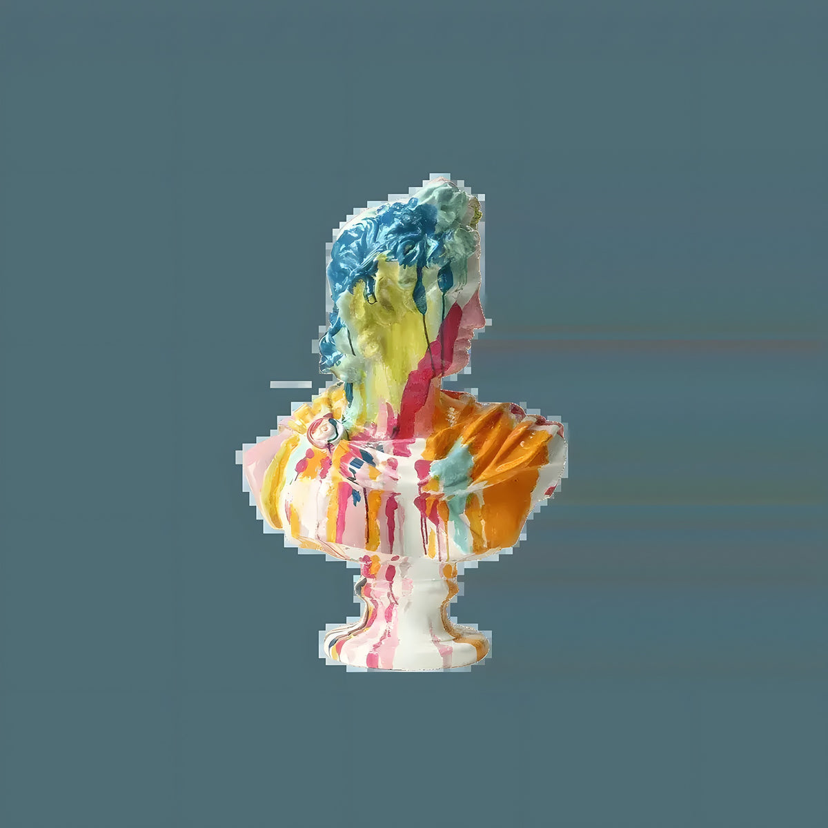 Side view of colorful splash-painted David plaster bust, dripping paint in blue, yellow, pink and orange, gray background