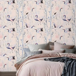 Birds of Paradise Pink Chinoiserie Wallpaper with dancing cranes and bamboo on blush ground, bedroom accent wall